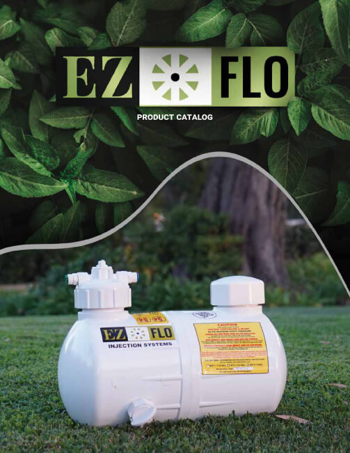 EZ FLO product catalog cover showing a white injection system unit placed on grass, with a backdrop of green foliage and the EZ FLO logo at the top.