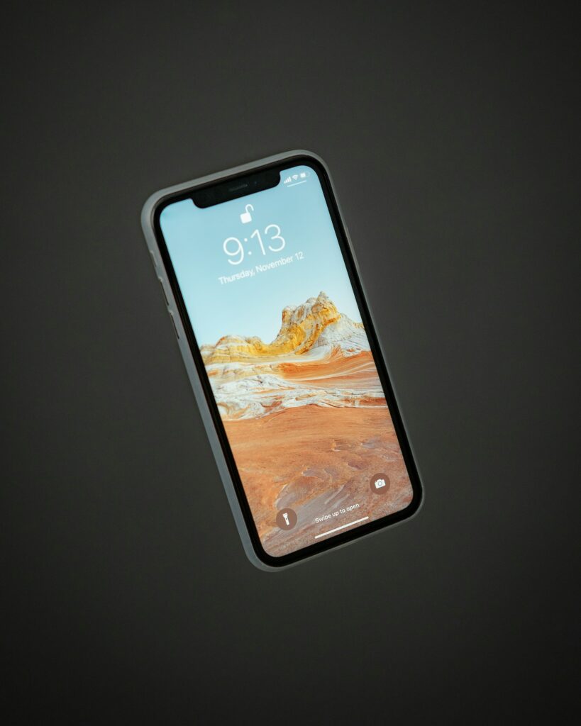 An Iphone Xr On A Black Background.