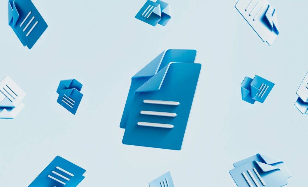 A bunch of blue folders flying around on a blue background, reminiscent of Google Docs.