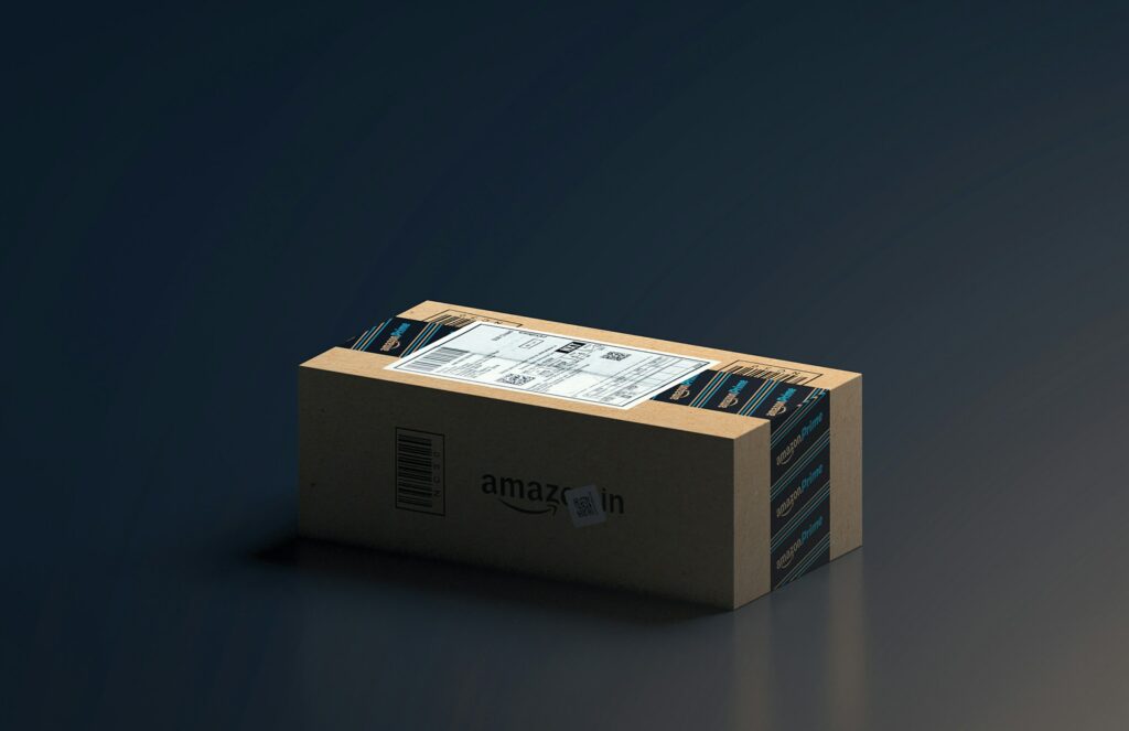 An Amazon promotional balance box sitting on a dark surface.