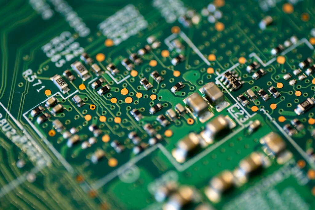 A Close Up Of A Green Circuit Board Featuring Intel Rapid Storage Technology.