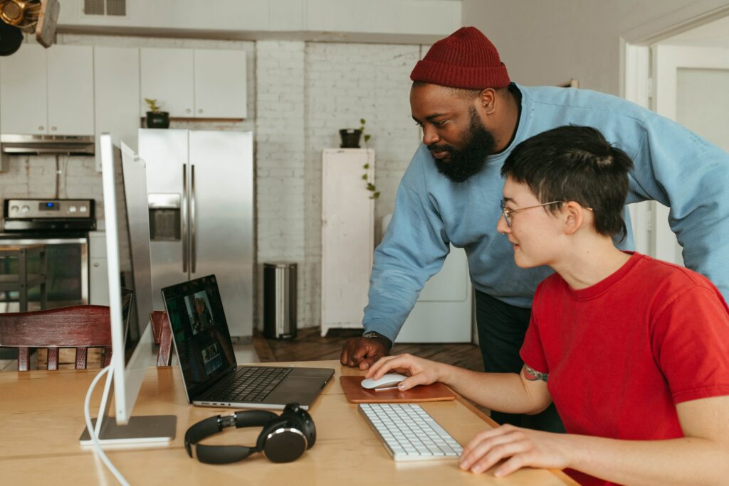 A video editor and a social media specialist collaborating on captivating content.