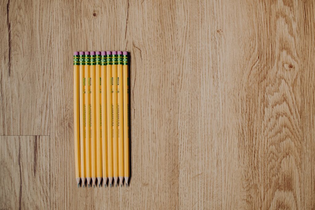 A surface with pencils.