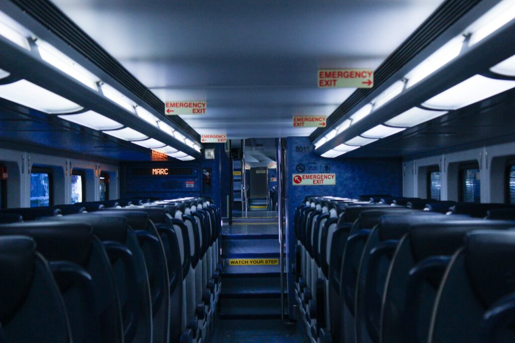 A train car with rows of seats at MozCon 2023.