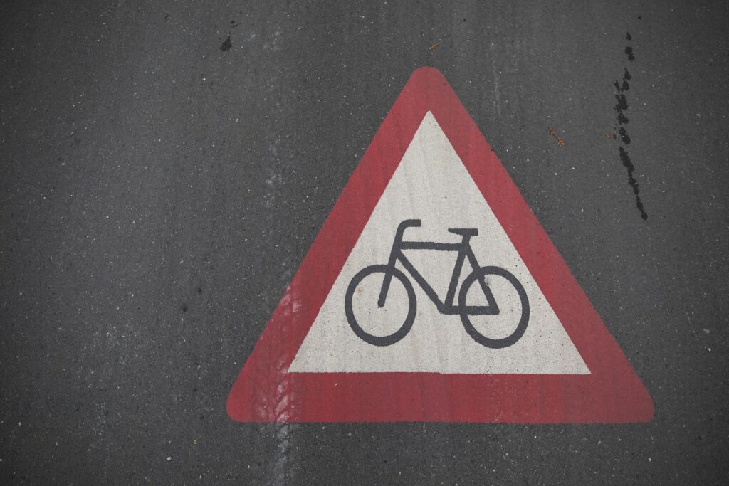 A road sign with a bicycle on it, revolutionizing content strategy.