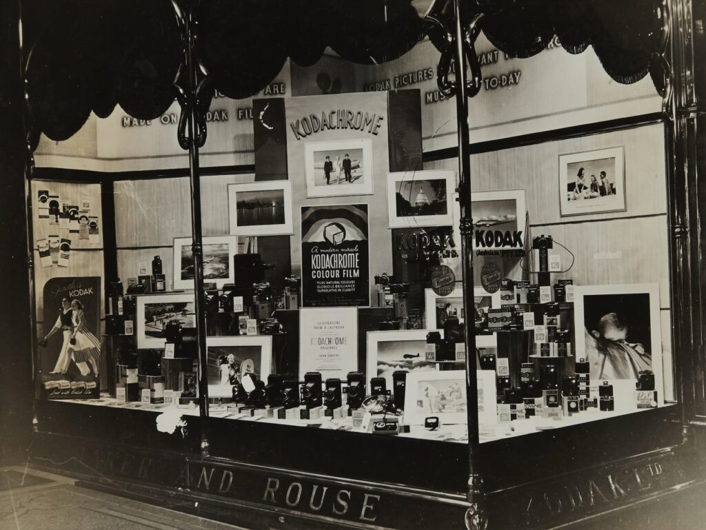 A black and white photo of a display case featuring TikTok's AI-Powered Creative Assistant.
