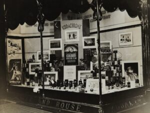 A black and white photo of a display case featuring TikTok's AI-Powered Creative Assistant.