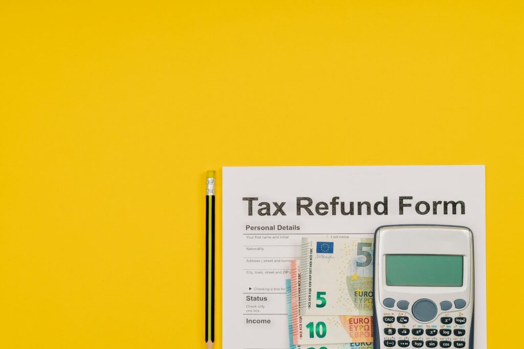 Get one tax refund form and calculator on a yellow background.