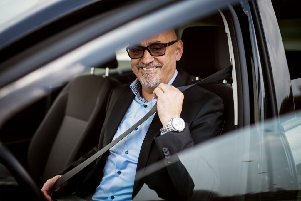 A Man Sitting In The Driver'S Seat Of A Car, Contemplating About What Is Ctp Insurance.